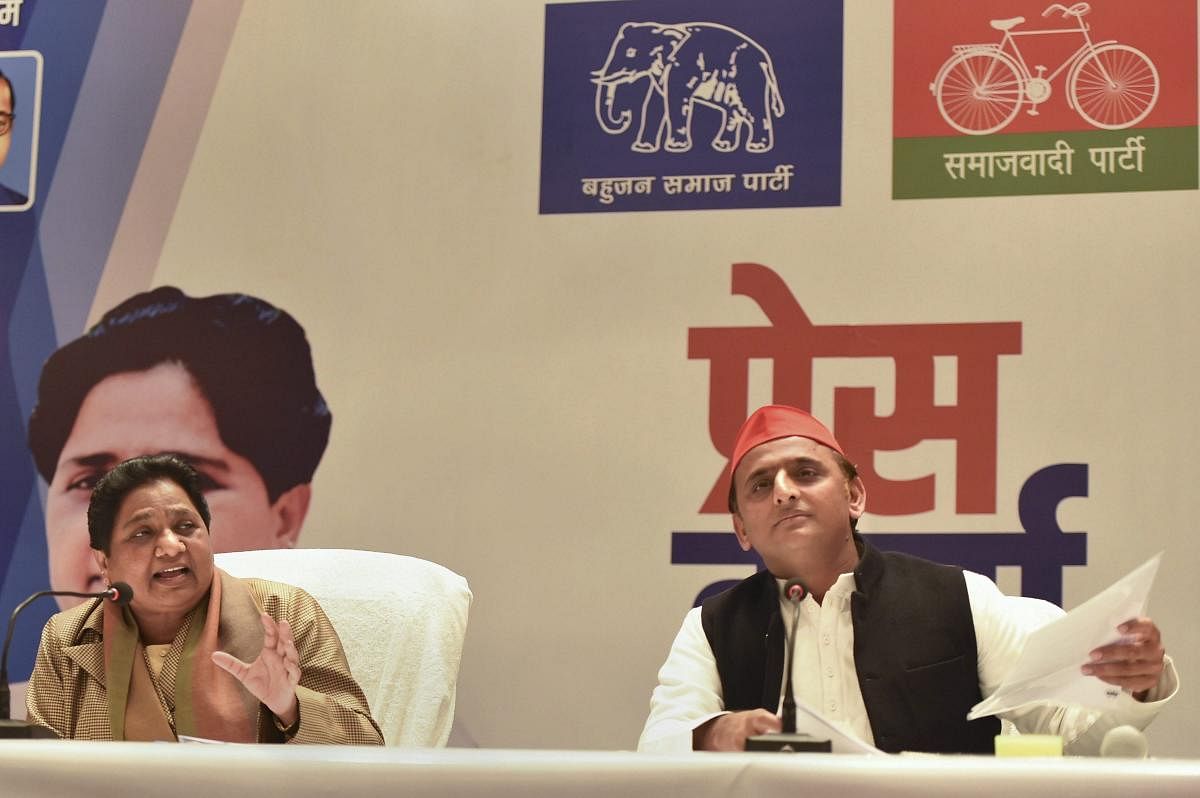 BSP supremo Mayawati and Samajwadi Party president Akhilesh Yadav during a joint press conference in Lucknow on Saturday. PTI