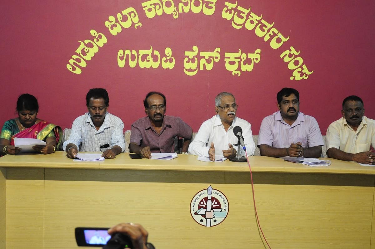 Mass India Mahithi Seva Samithi State President G A Koteyar speaks at a press conference in Udupi on Monday.