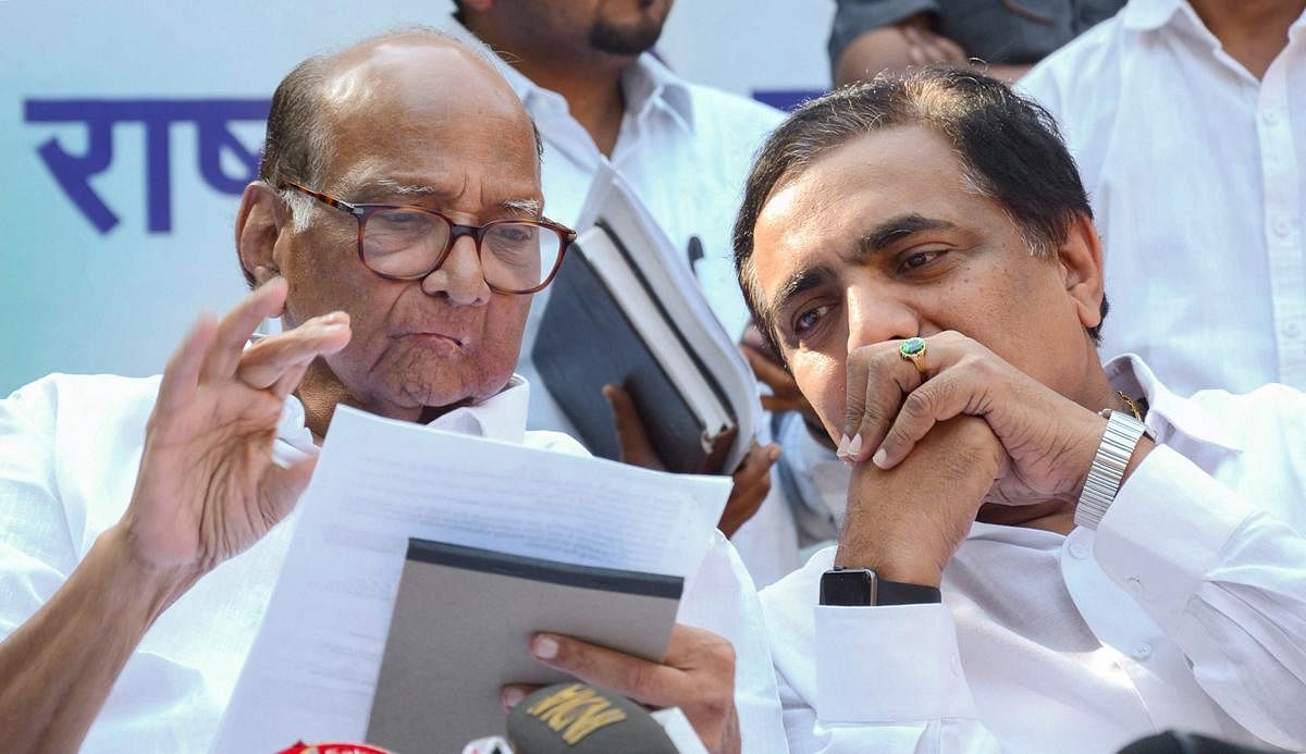 Nationalist Congress Party chief Sharad Pawar and state NCP chief Jayant Patil during the announcement of Lok Sabha candidates, in Mumbai, Friday, March 15, 2019. PTI