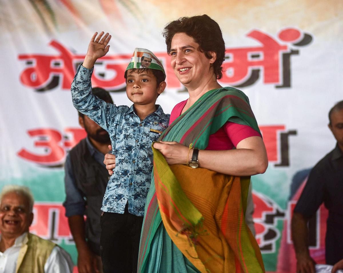 Congress General Secretary and Eastern Uttar Pradesh incharge Priyanka Gandhi Vadra interacts with villagers during her party's campaign for the upcoming Lok Sabha elections in UP, at Sirsa village in Prayagraj (Allahabad), Monday, March 18, 2019. (PTI Ph