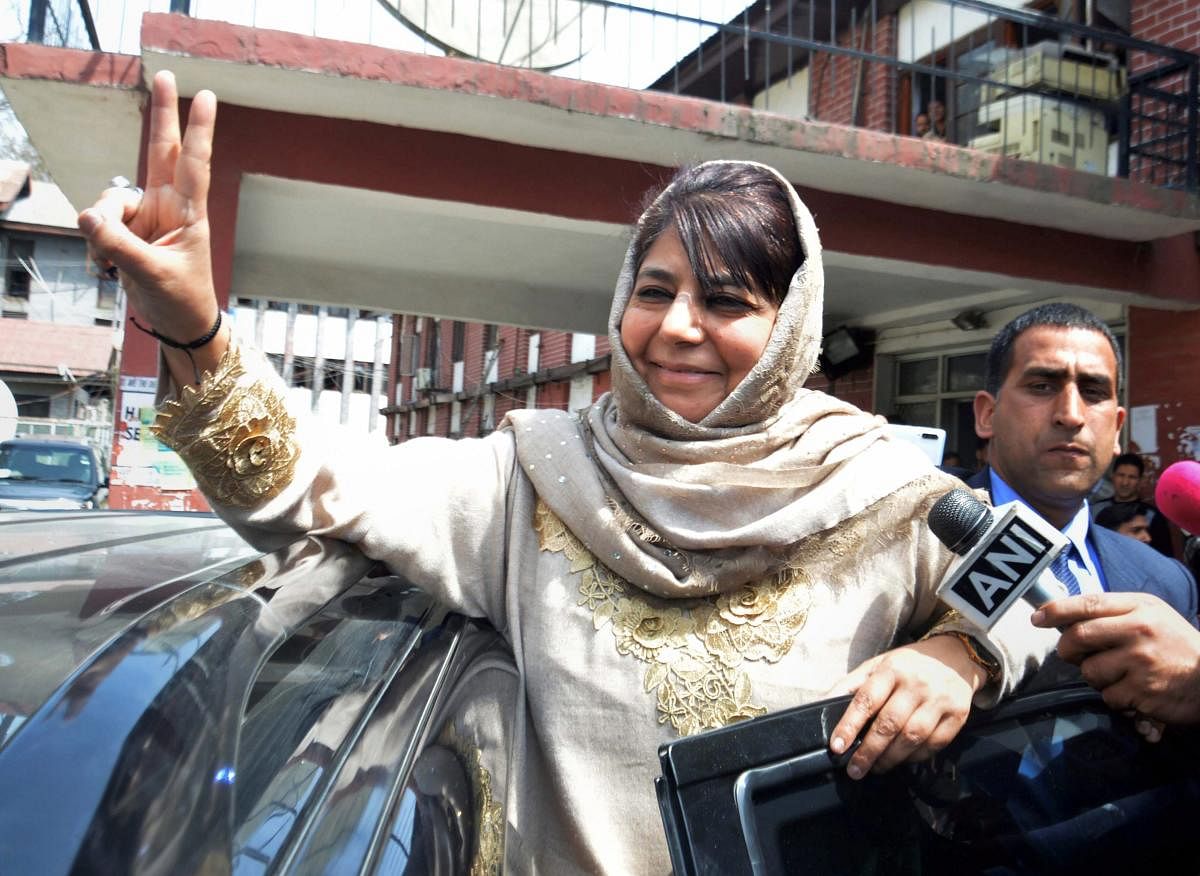 Peoples Democratic Party (PDP) chief and former chief minister Mehbooba Mufti shows victory sign as she leaves after filing her nomination papers from Anantnag, ahead of Lok Sabha elections, at Anantnag district of Kashmir, Wednesday, April 03, 2019. (PTI