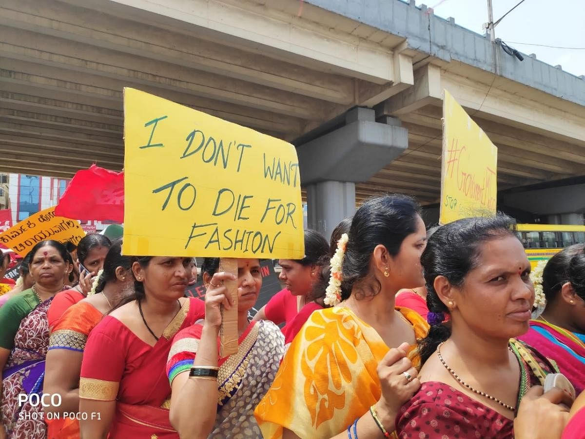 About 2,000 garment workers took out a rally on Wednesday from Kanteerava Studio to TVS junction in Peenya, demanding fair wages, better working conditions and protection from sexual harassment at the workplace.