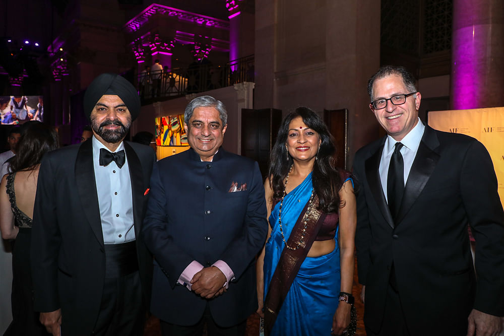 Aditya Puri (second from left) and Michael Dell (right) with AIF's Lata Krishnan (second from right) and Ajay Banga. Photo credit: AIF