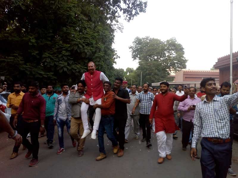 Celebrations outside D G Vanzara's residence in Gandhnagar. (DH Photo/Satish Jha)