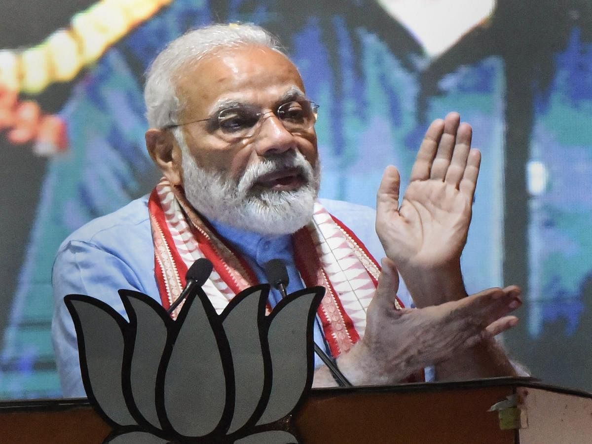 Prime Minister Narendra Modi gestures as he speaks during an election rally, ahead of Lok Sabha polls, in Gaya, Tuesday, April 2, 2019. (PTI Photo)