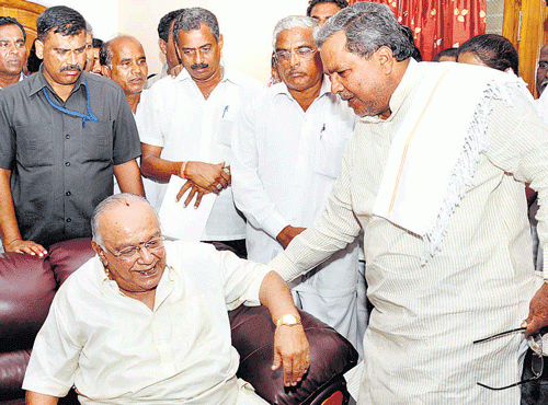 Master Hirannaiah and Siddaramaiah. File photo