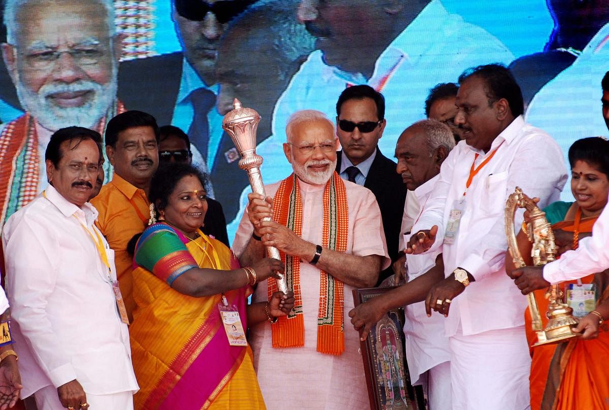  Prime Minister Narendra Modi being felicitated by BJP leaders during a public meeting, in Madurai, Sunday, Jan. 27, 2019. (PTI Photo) 