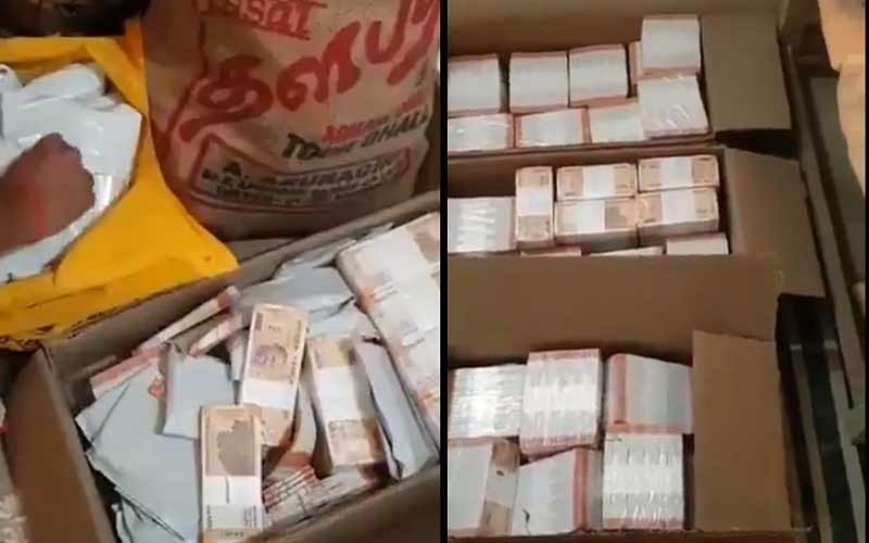 Income Tax officials had seized a total of Rs 11.53 crore from the cement godown in Vellore, sources said, adding that the cash was neatly packed and had ward numbers written on them. (Screen grab)