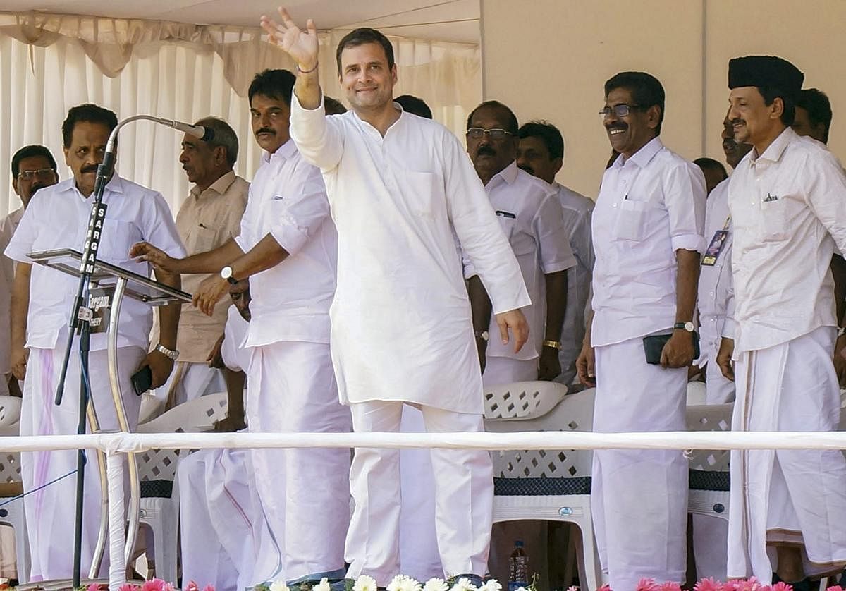 Congress President Rahul Gandhi waves to the crowd during an election campaign rally Lok Sabha polls, at Batheri in Wayanad, Wednesday, April 17, 2019. (PTI)