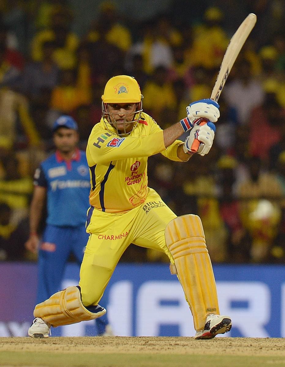 Chennai Super Kings' Mahendra Singh Dhoni will look to end the league stage on a high when they take on Kings XI Punjab. AFP