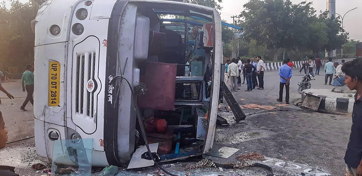 A bus ferrying over 40 women employees of a private company overturned after it was hit by a speeding truck, resulting in injuries to several passengers, police said. PTI Photo