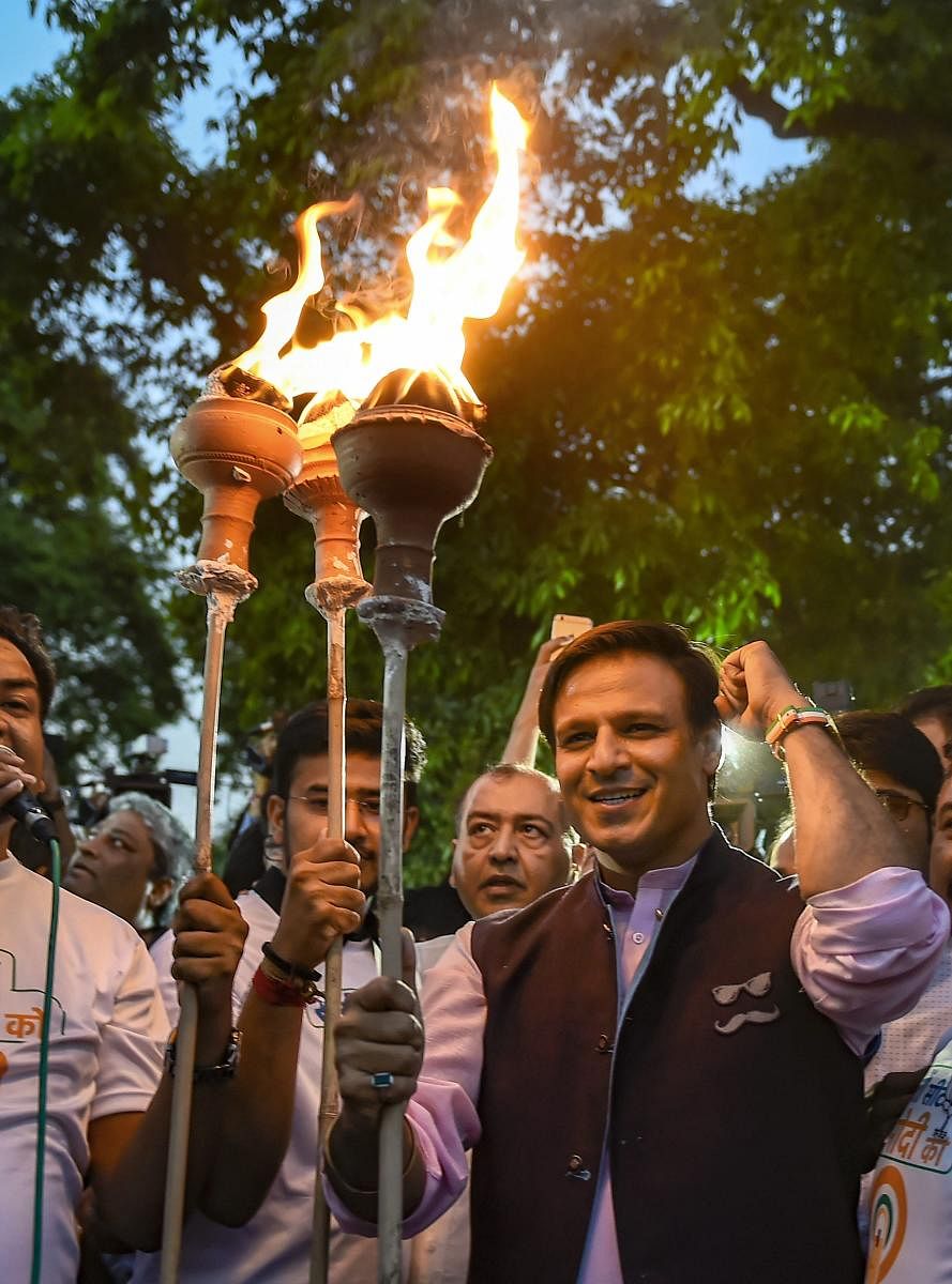Bollywood actor Vivek Oberoi takes part in an election campaign in support of BJP, ahead of the fifth phase of Lok Sabha polls, at India Gate. PTI Photo
