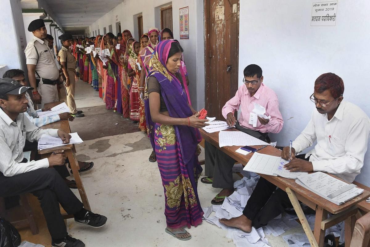 Women voters stand in a long queue at a polling station, during the 5th phase of Lok Sabha polls, in Chhapra district of Bihar, Monday May 6, 2019. (PTI Photo)