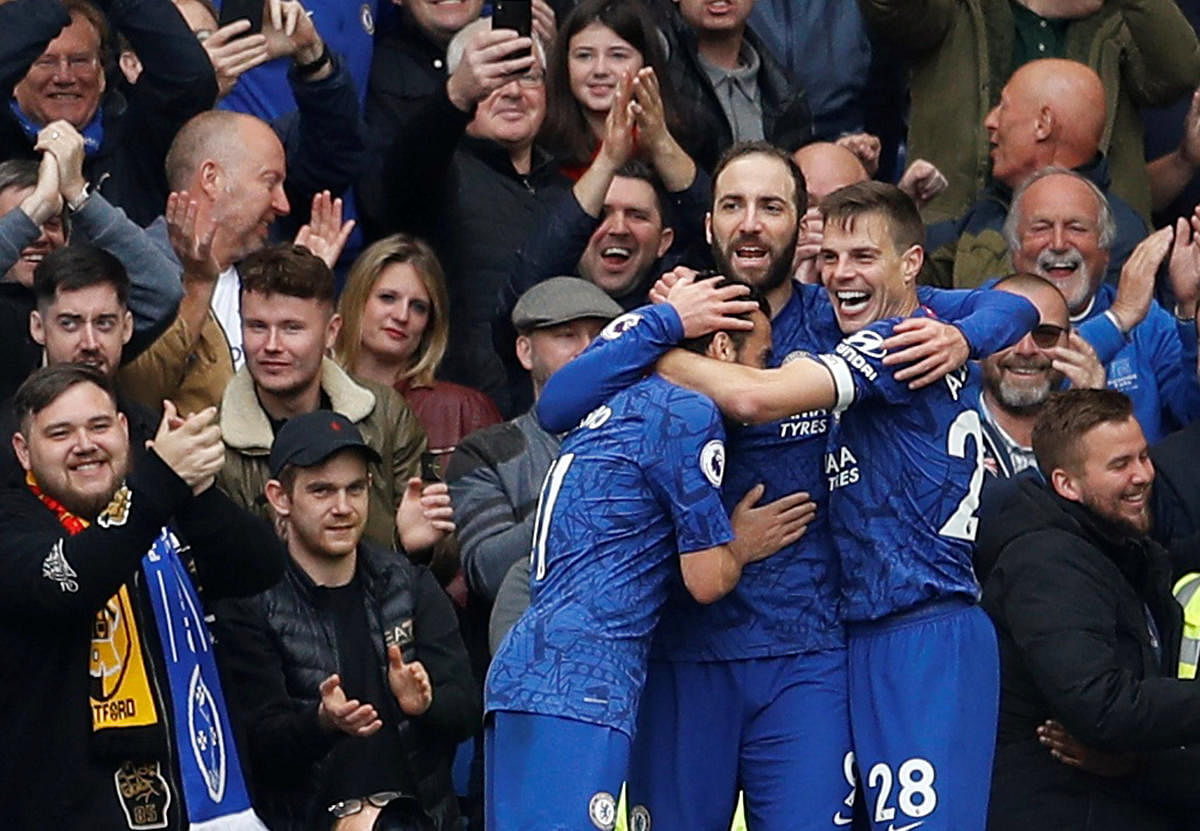 Chelsea's Gonzalo Higuain (centre) celebrates after scoring against Watford on Sunday. Reuters