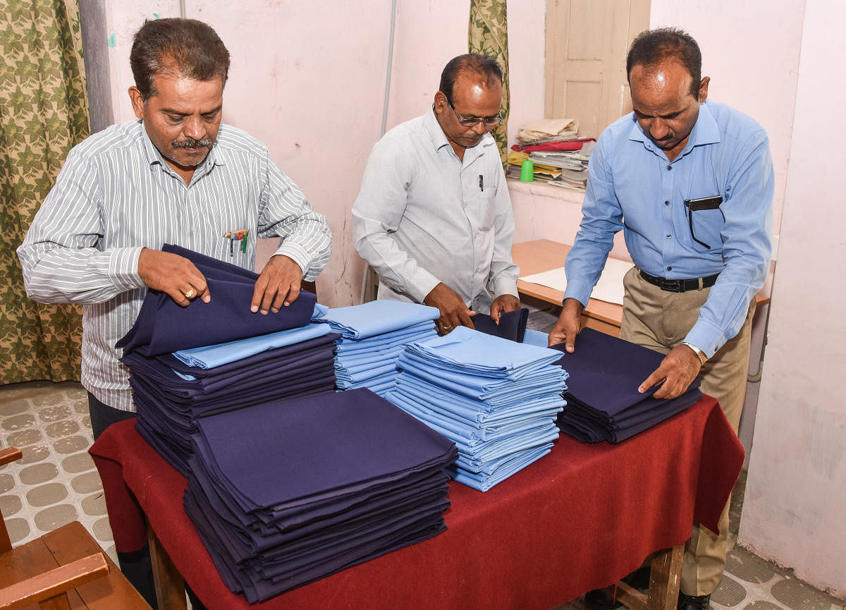 The tender process for supply of school uniforms to two revenue divisions of the state is yet to be completed. DH Photo