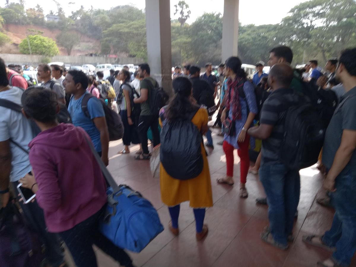 Passengers who arrived in the voter special train at Mangalore junction.