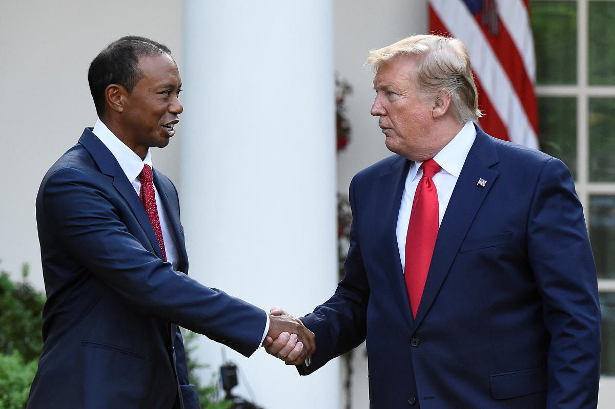 Golfer Tiger Woods is awarded the Presidential Medal of Freedom, the nation's highest civilian honor, by U.S. President Donald Trump in the Rose Garden at the White House in Washington, US. Reuters