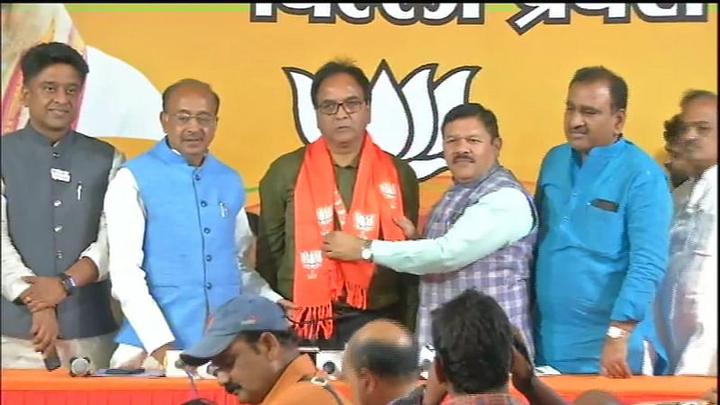 BJP leaders welcome Anil Bajpai to the party. (ANI/Twitter)