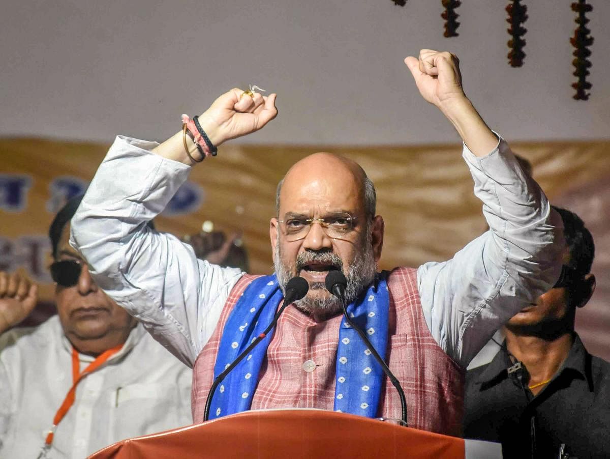 BJP president Amit Shah on Wednesday claimed that this Lok Sabha election is a fight between '3 Gs' of the Congress represented by the Gandhi family and those of the saffron party exemplified by gaon, goumata and the Ganga. PTI file photo