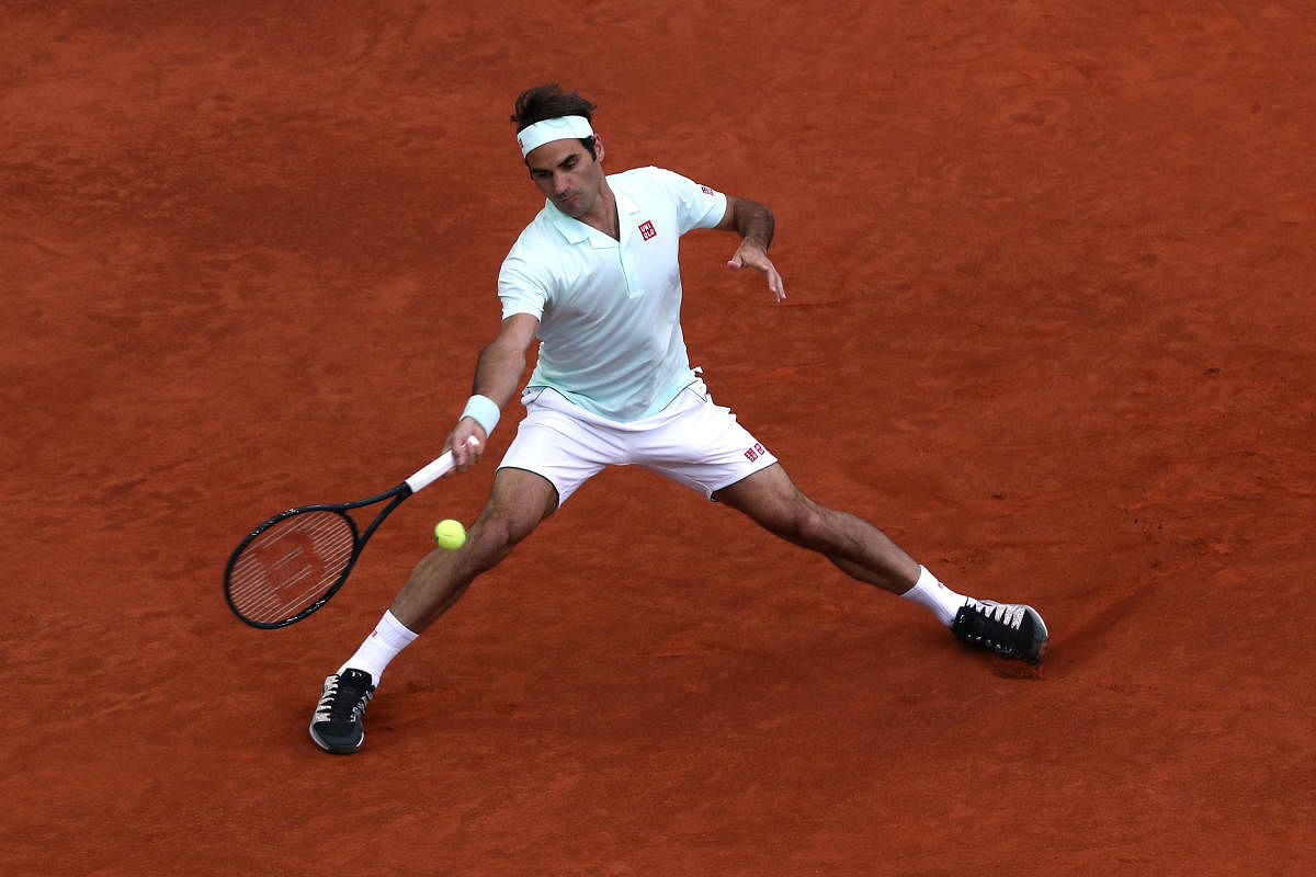 Switzerland's Roger Federer in action during his round of 32 match against France's Richard Gasquet. Reuters photo
