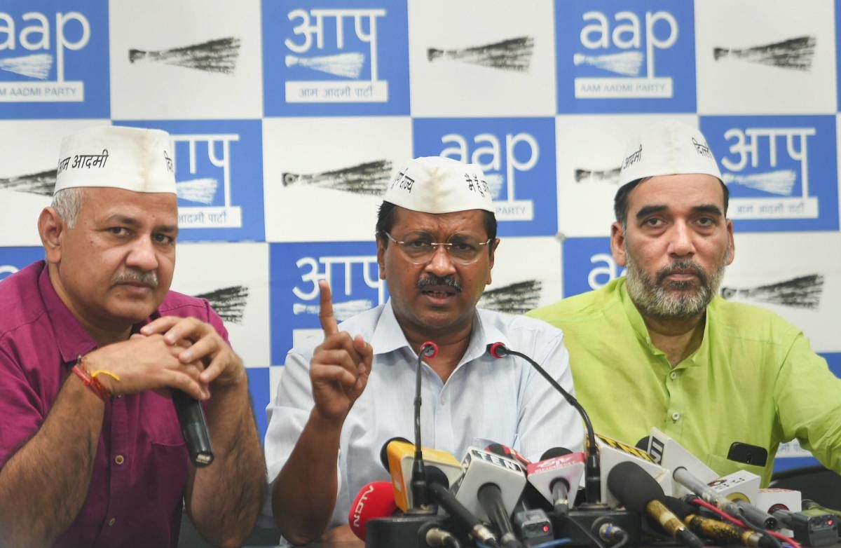 Delhi Chief Minister and Aam Aadmi Party (AAP) convenor Arvind Kejriwal with his deputy Manish Sisodia and party leader Gopal Rai address the media, in New Delhi, Wednesday, May 8, 2019. (PTI Photo)