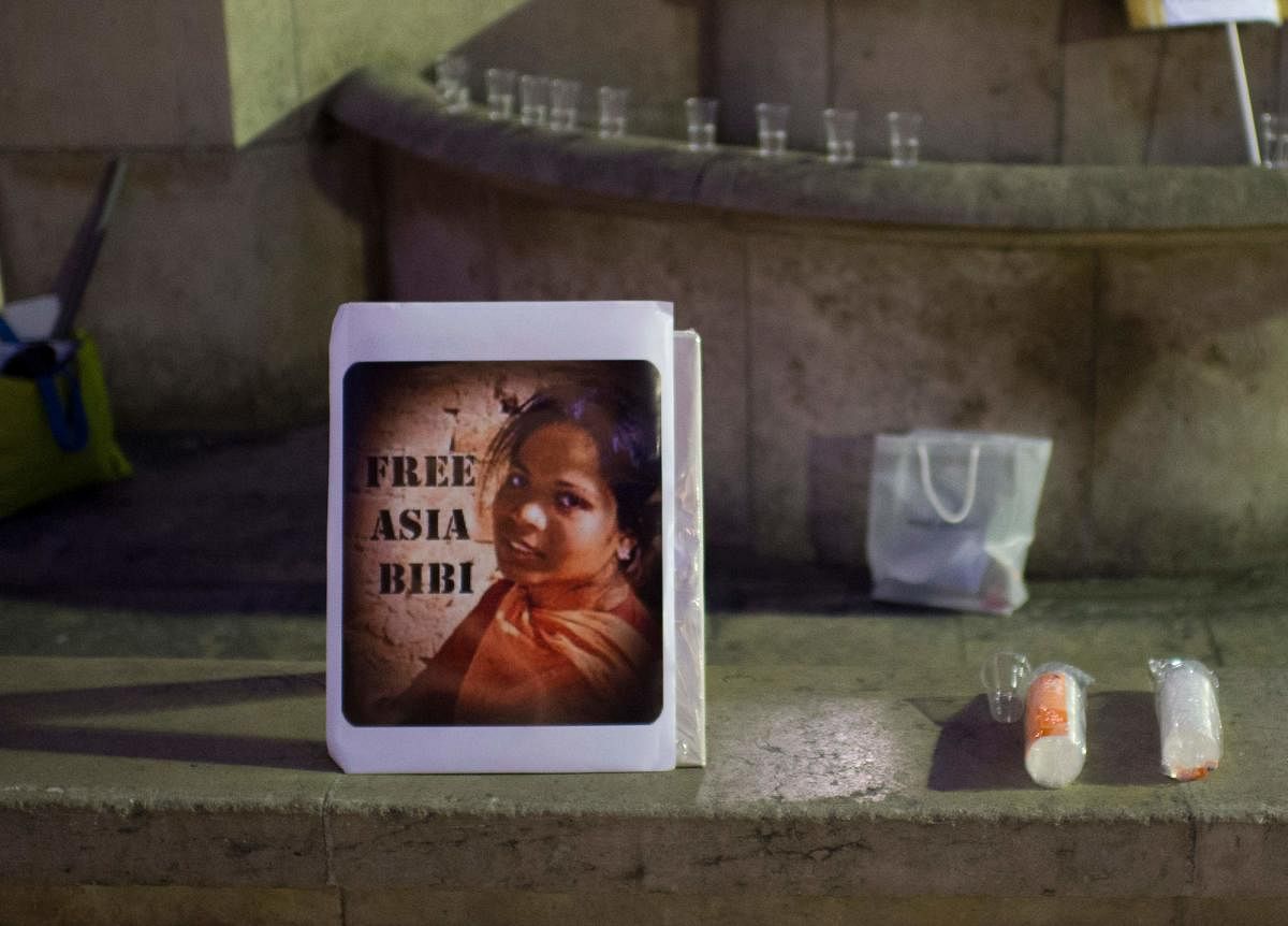 In this file photo taken on October 29, 2014, a portrait of Pakistan's Asia Bibi is displayed during a demonstration to protest against her death sentence in Paris. AFP file photo.
