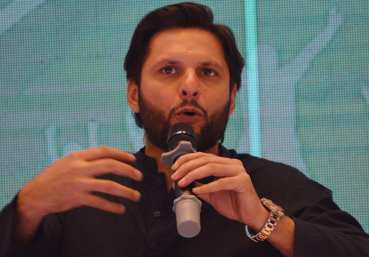 Pakistani cricketer Shahid Afridi speaks during a press conference to present his autobiography in Karachi on May 4, 2019. - When Pakistan's Shahid Afridi smashed a 37-ball century against Sri Lanka in 1996, he not only registered the fastest-ever one-day