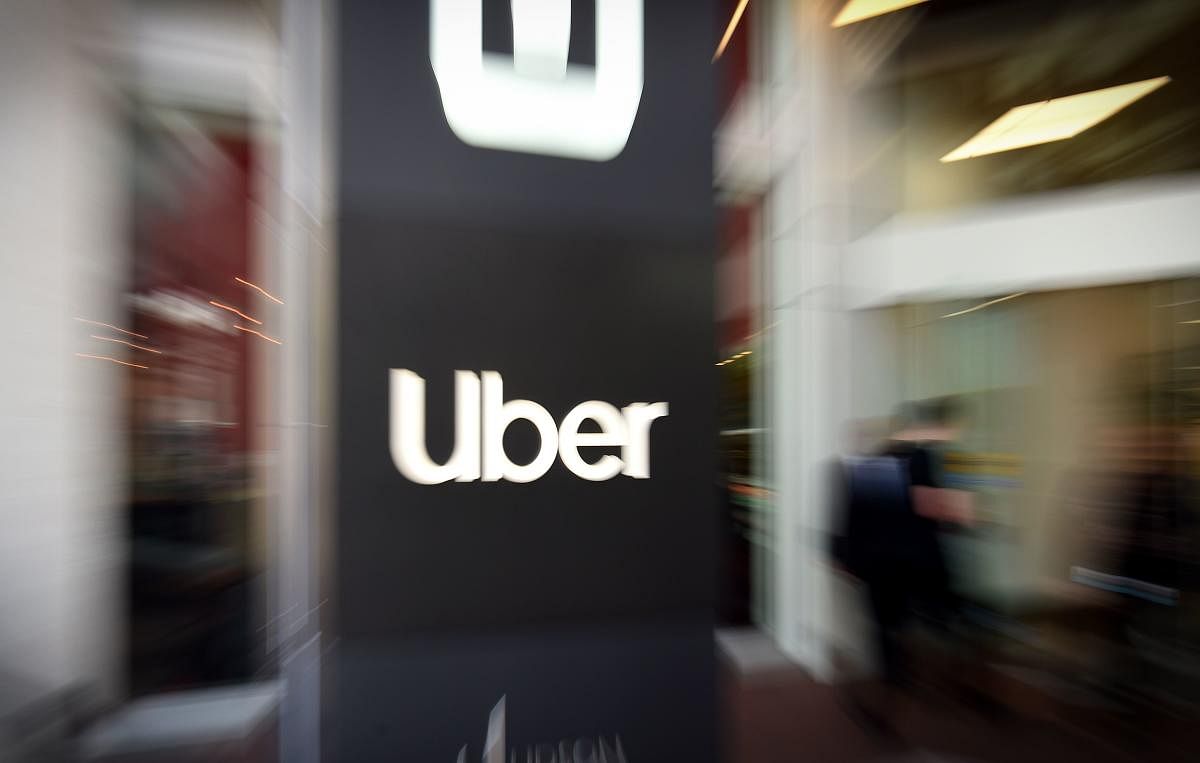 (FILES) In this file photo taken on May 08, 2019 In this pan zoom image, an Uber logo is seen outside the company's headquarters in San Francisco, California on May 8, 2019. - Uber is expected to reveal pricing on May 9, 2018, for a massive share offering