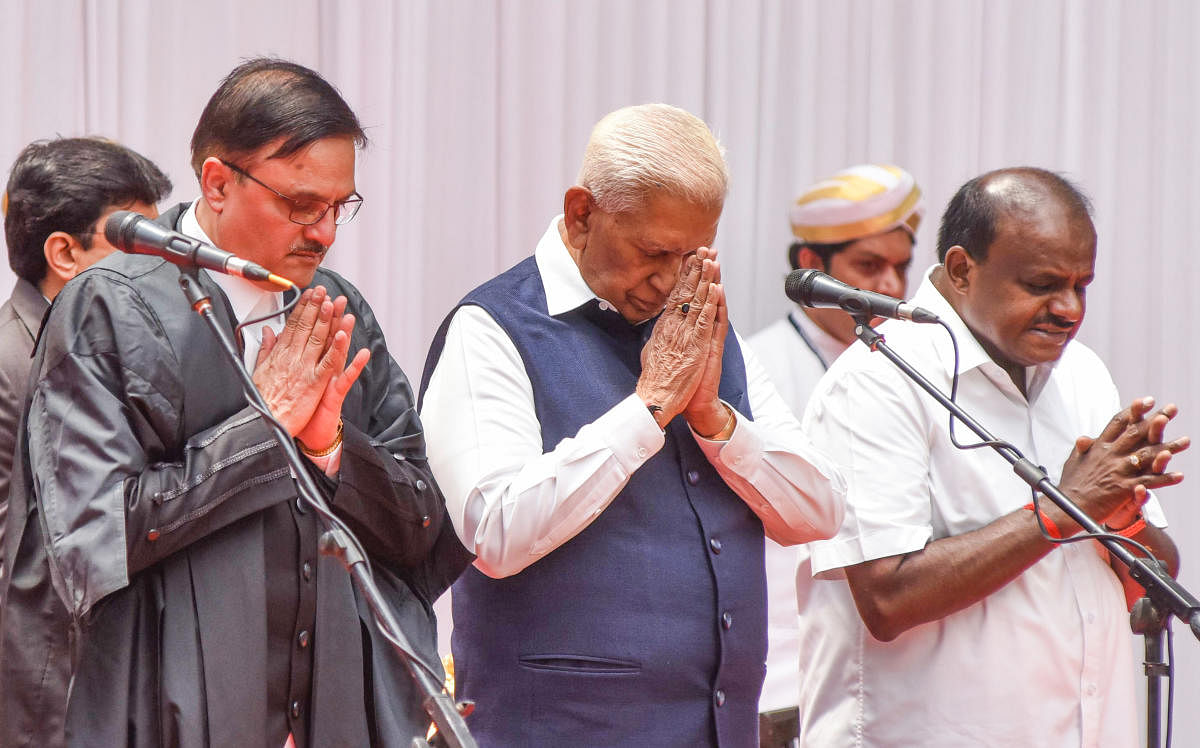 Governor Vajubhai R Vala administered the oath of office to Justice Oka at a ceremony held at the at Glass House in Raj Bhavan in the city. CM H D Kumaraswamy is also seen.