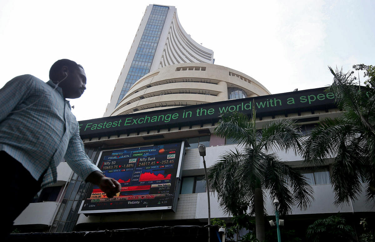 A man walks past the Bombay Stock Exchange (BSE) building in Mumbai, India October 4, 2018. REUTERS/Francis Mascarenhas