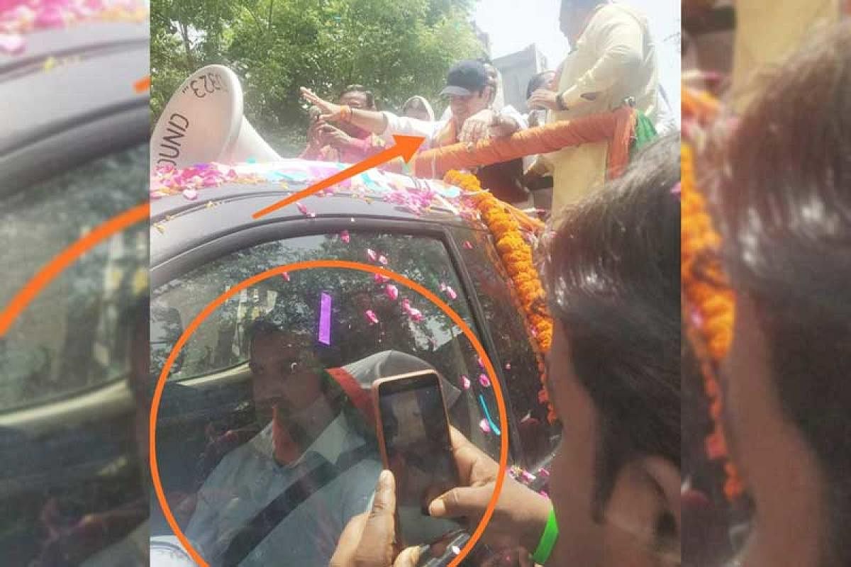 Tweeting a picture of Gambhir sitting inside a car, Sisodia said, "Gambhir is sitting inside an AC car due to scorching heat, while his lookalike who is a Congress leader is campaigning on his behalf."