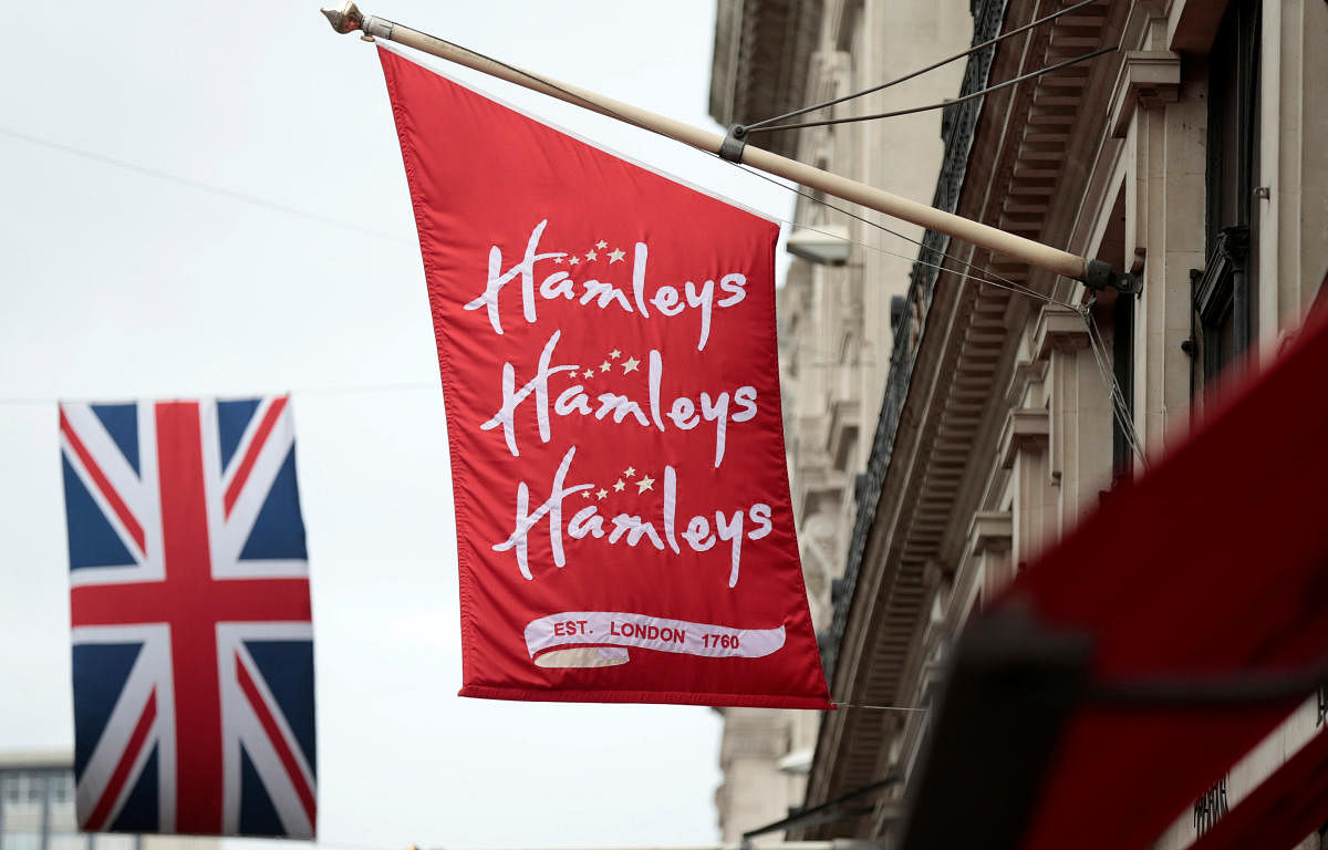 A flag flies outside the Hamleys toy shop in London. Reuters