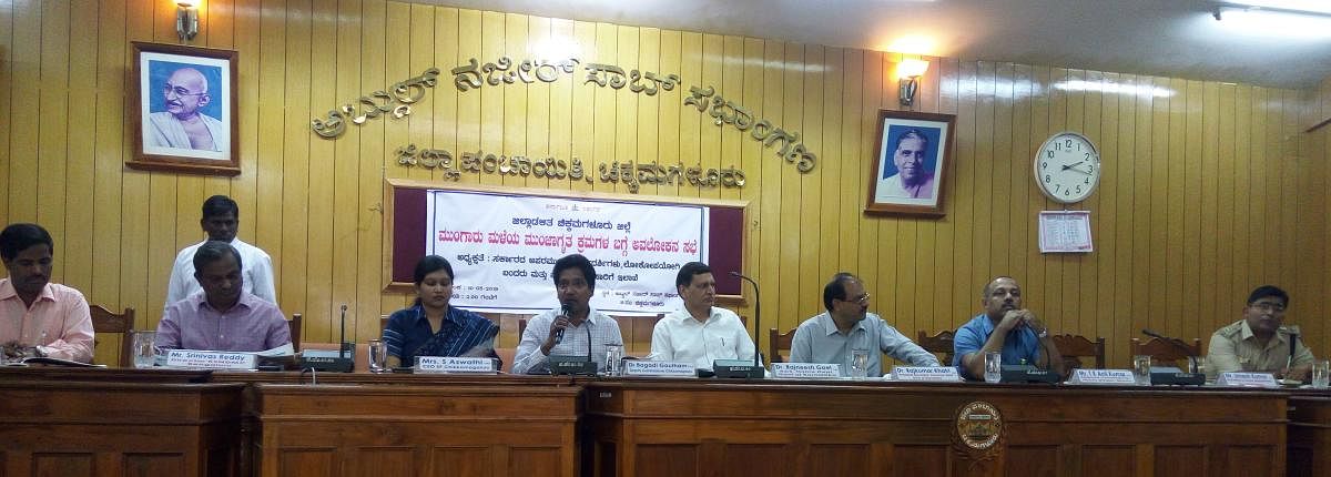 Deputy Commissioner Dr Bagadi Gautham speaks during a meeting held at Zilla Panchayat conference hall in Chikkamagaluru.