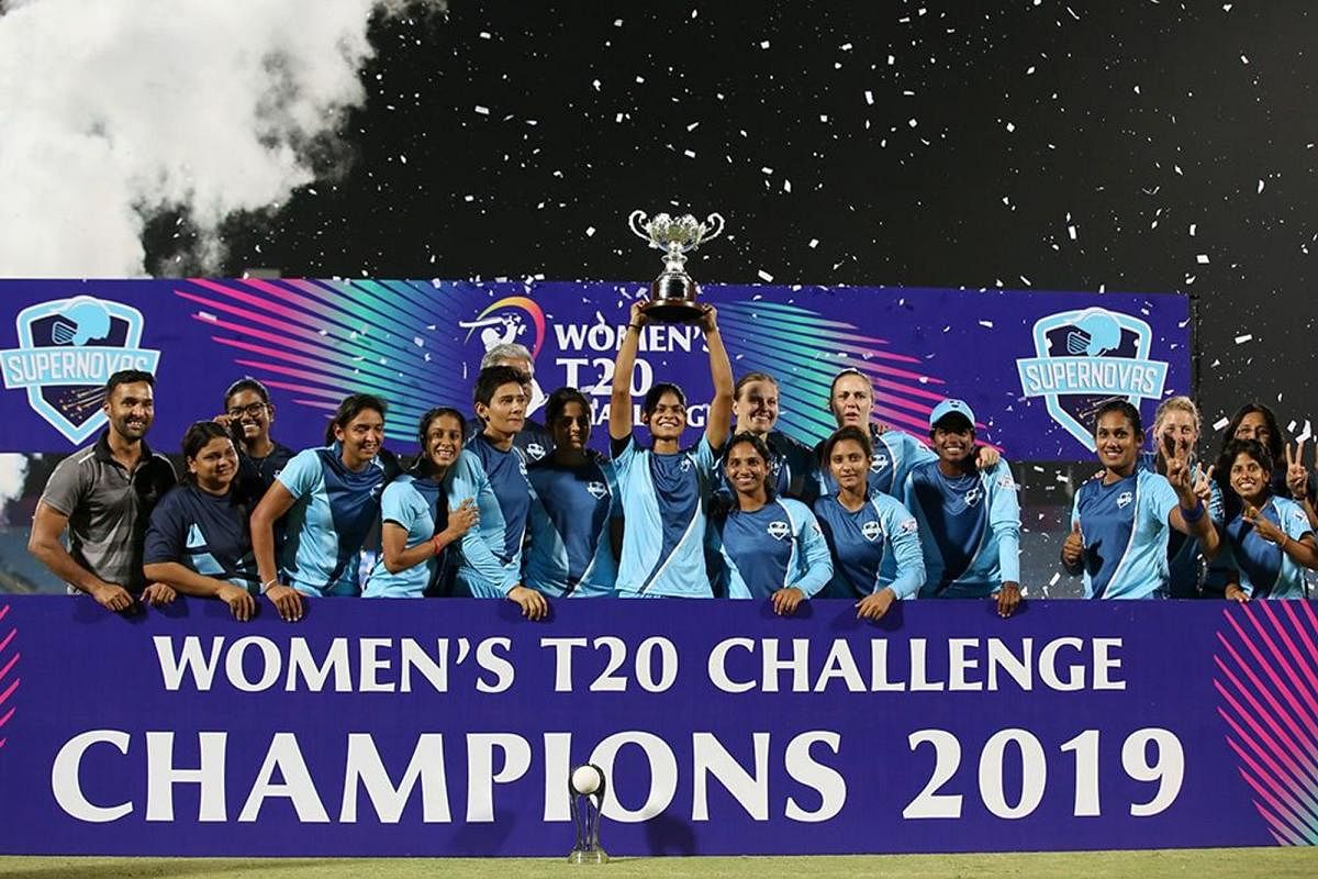 Supernovas' players celebrate with the trophy after winning the Women's T20 Challenge in Jaipur on Saturday. IPL Media