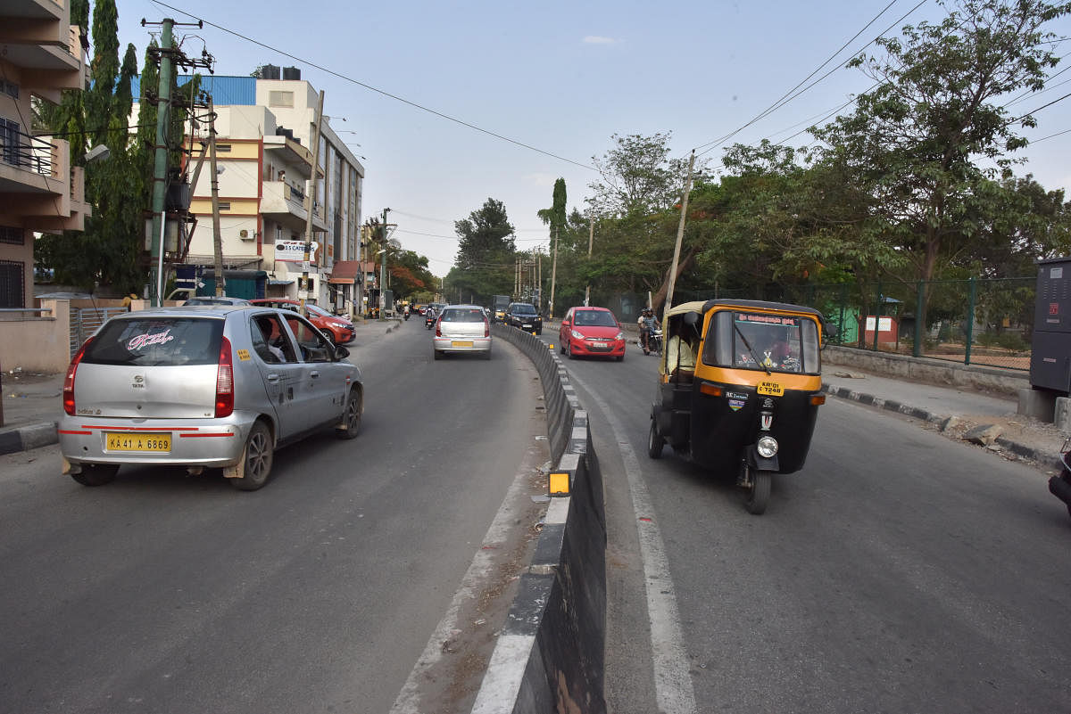BBMP road widening on Madiwala tank bund road in Bengaluru. DH Photo/Janardhan B K
