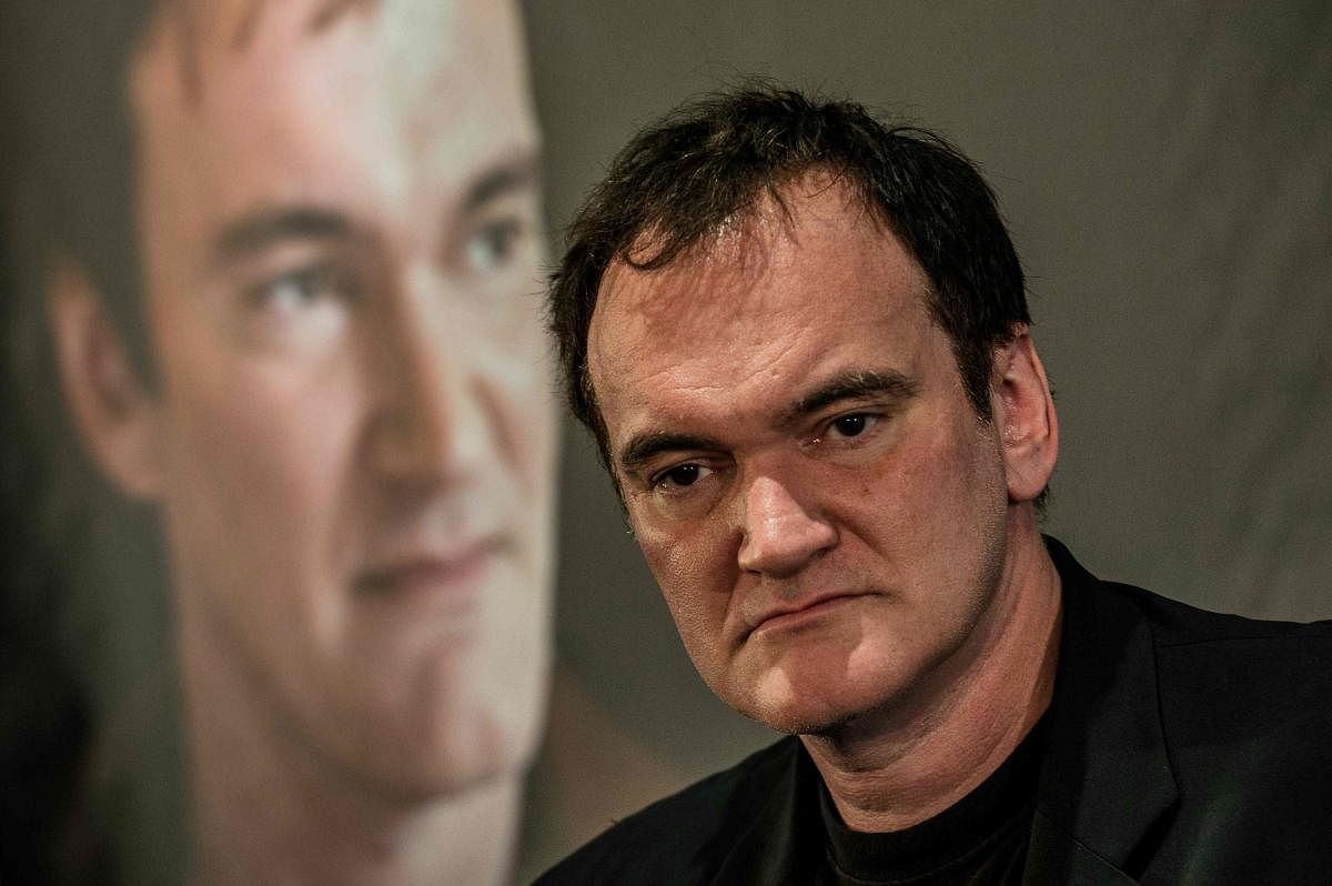 Quentin Tarantino apparently slaved for four months straight in the editing room to get his odyssey through Tinseltown's darkest year in as a late entry for Cannes. AFP file photo