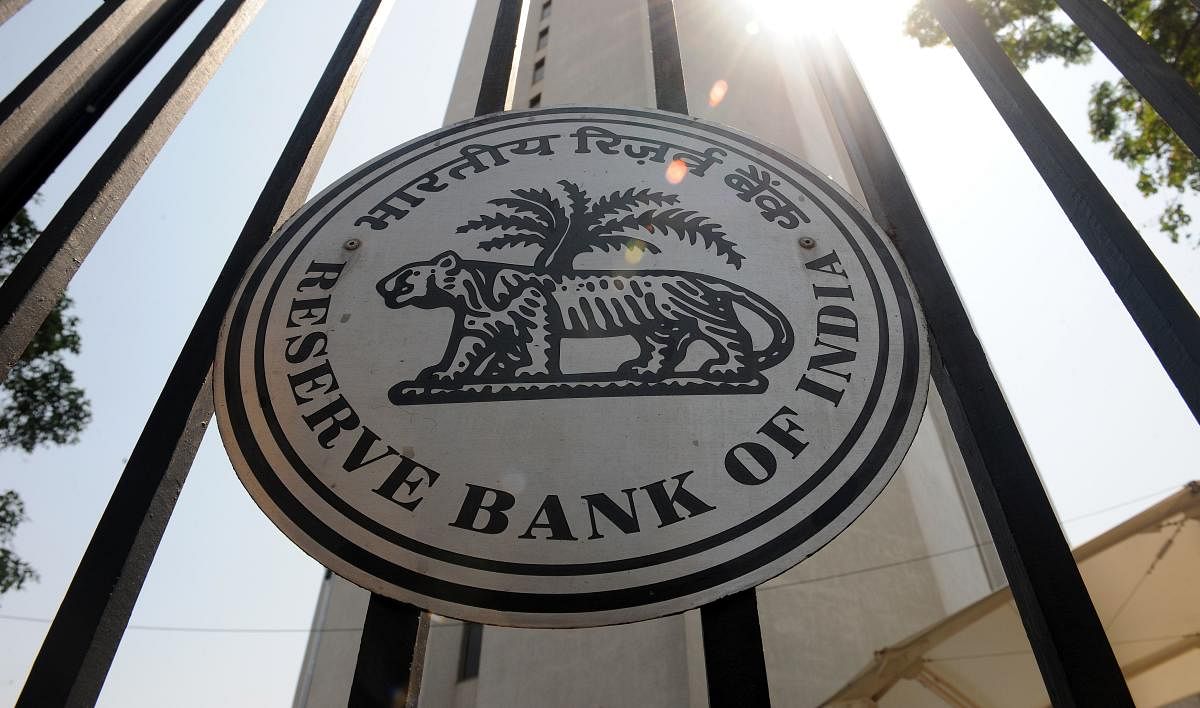Reserve Bank of India (RBI) logo is seen on the main entrance gate of the RBI headquarters in Mumbai. (AFP File Photo)