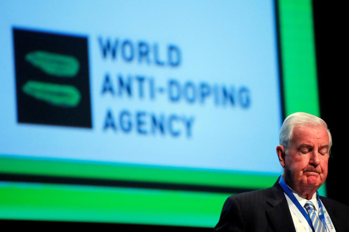 FILE PHOTO: Craig Reedie, President of the World Anti Doping Agency (WADA) attends the WADA Symposium in Ecublens, near Lausanne, Switzerland, March 21, 2018. REUTERS/Denis Balibouse/File Photo