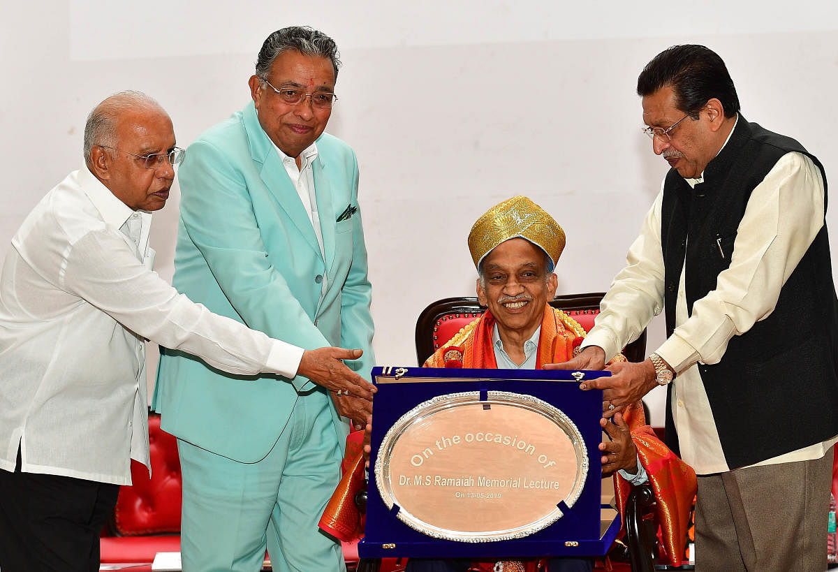 Former Isro chairman A S Kiran Kumar being felicitated by M R Ramaiah, M R Jayaram and M R Seetharam. DH photo