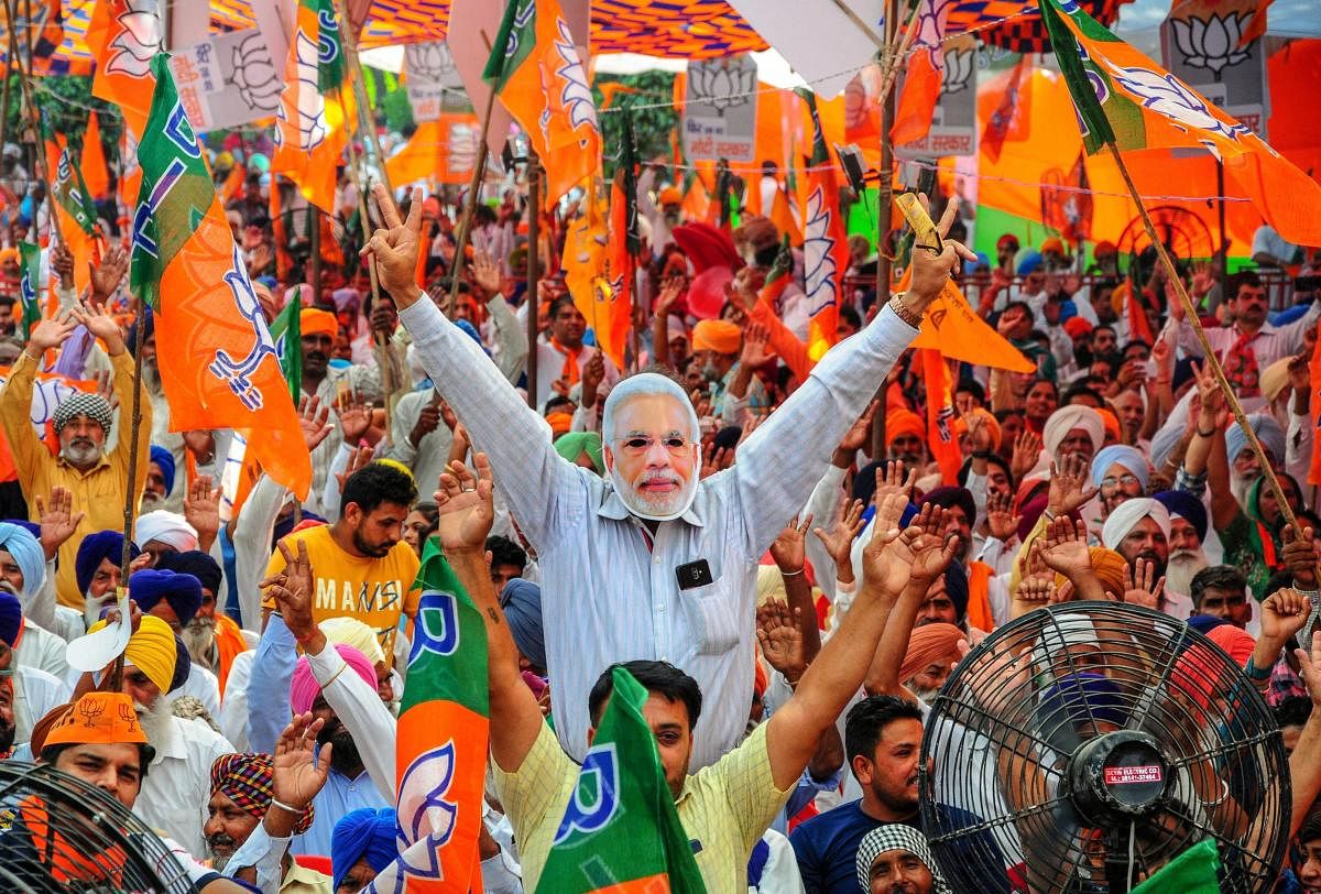 BJP supporters during an election campaign rally for the ongoing Lok Sabha polls, in Amritsar on May 12, 2019. (PTI Photo) 