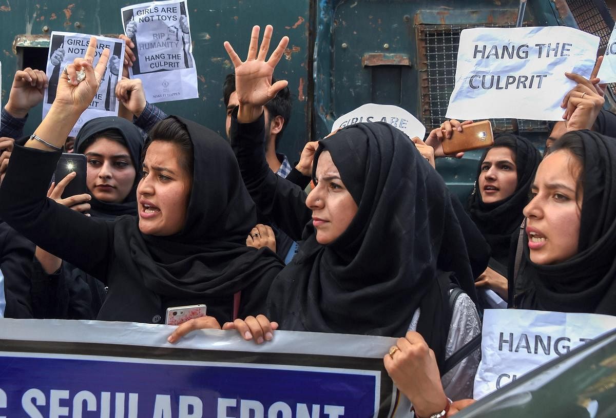 Students shout slogans during a protest in Srinagar on May 14, 2019. Several protests were taken out by students of various educational institutes over the alleged rape of three year old girl by a local, in Sumbal area of Bandipora district of North Kashmir. (PTI Photo)