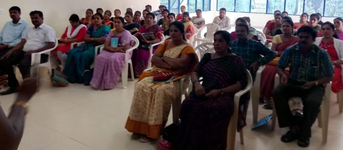 Teachers attend coaching classes at Krishik Bhavan, in Hassan, recently.