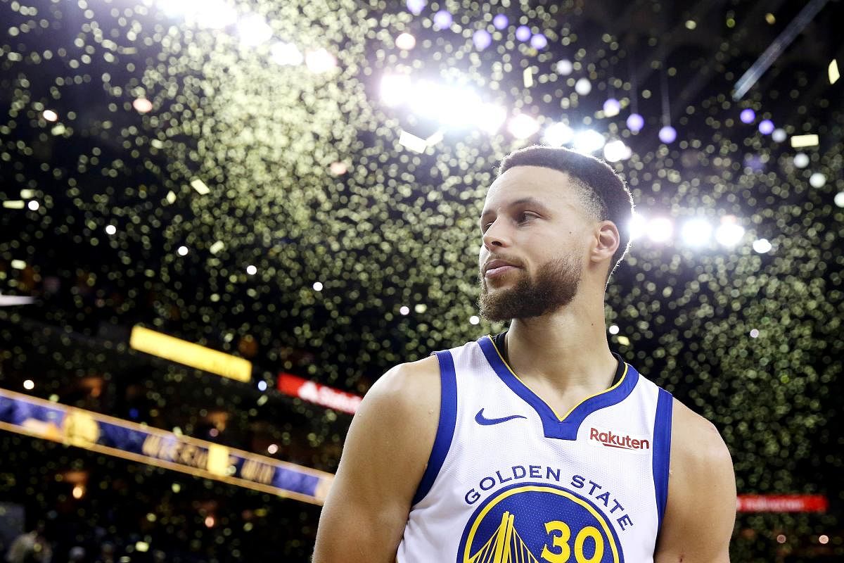 OAKLAND, CALIFORNIA: Stephen Curry #30 of the Golden State Warriors reacts after defeating the Portland Trail Blazers 116-94 in game one of the NBA Western Conference Finals at ORACLE Arena. (AFP File Photo)