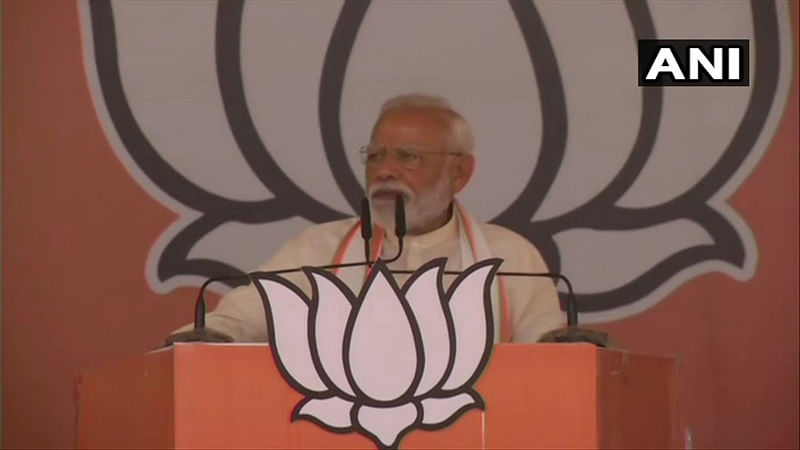 ''TMC hooligans vandalized Vidyasagar's statue....we will install his statue there,'' Modi said addressing an election rally at Mau. (Image: ANI/Twitter)