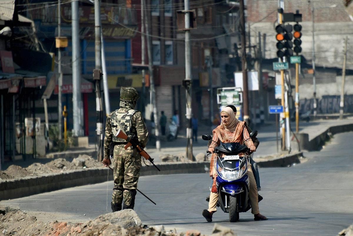 Srinagar: Authorities imposed curfew-like restrictions as a precautionary measure in downtown Srinagar. (PTI Photo)