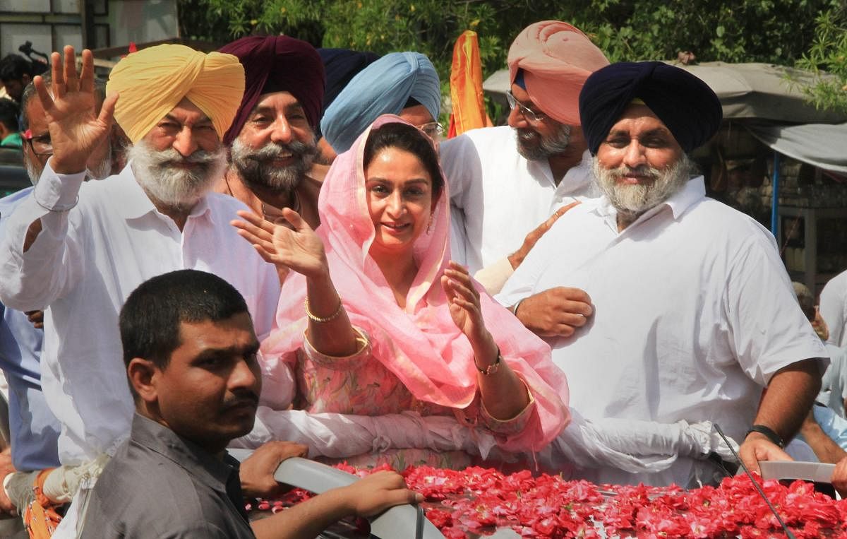 Union minister and Akali Dal candidate from Bathinda constituency Harsimrat Kaur Badal during an election roadshow for nomination papers filing ahead of Lok Sabha polls, in Bathinda, on April 26, 2019. Also seen is her husband and SAD president Sukhbir Si