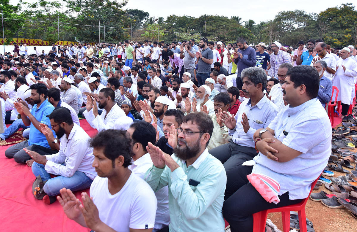 A large number of people from the Muslim community offer special prayers at Nehru Maidan in Mangaluru on Wednesday.