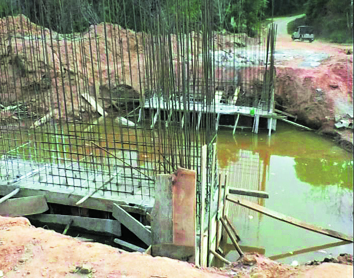 The construction work of a bridge going at a snail's pace at Kalur village in Kodagu.