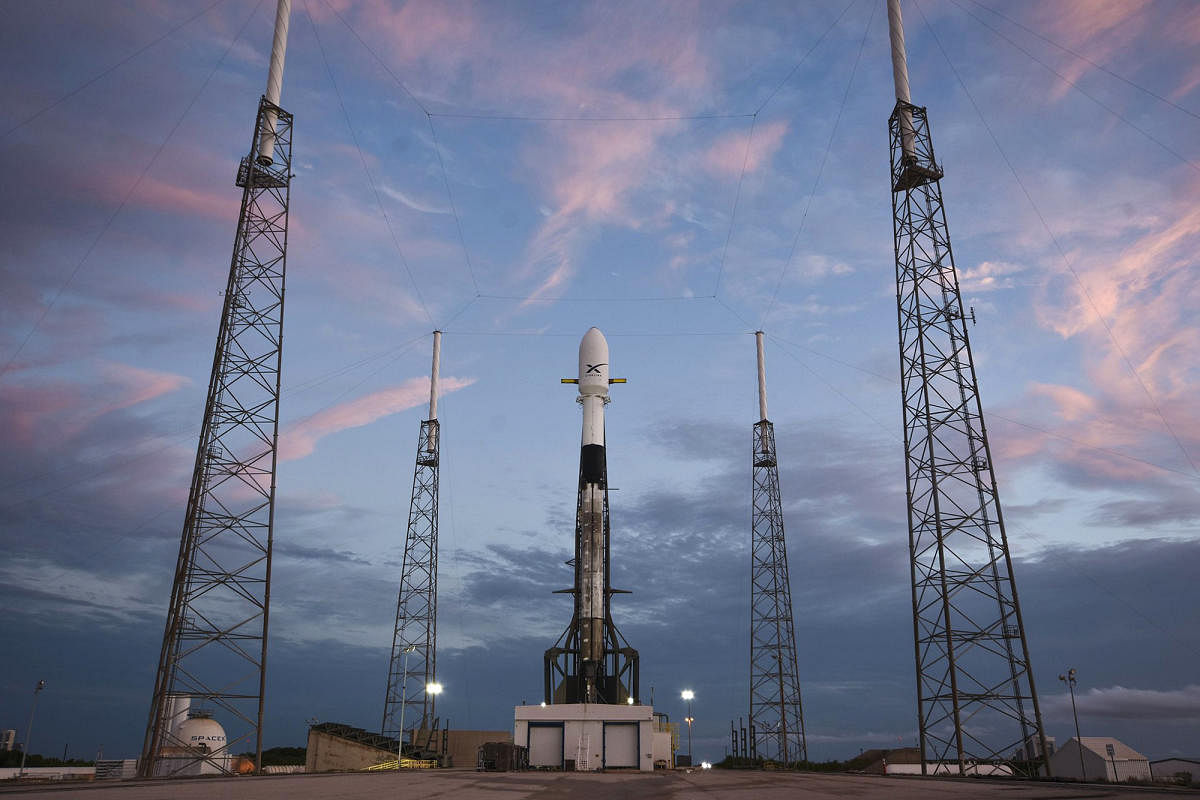 This handout photo released by SpaceX on May 14, 2019 shows Falcon 9 a day before the scheduled launch of 60 Starlink satellites from Space Launch Complex 40 at Cape Canaveral Air Force Station in Cape Canaveral, Florida. (Photo by Handout / SPACEX / AFP)