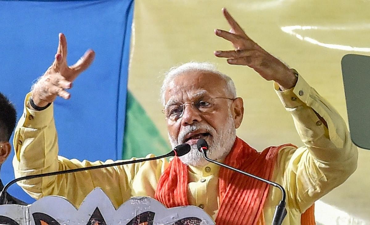 "This Sunday when you go to cast your vote then you will be scripting history. After decades you will elect a majority govt for the second time in a row," Modi told the voters. PTI file photo